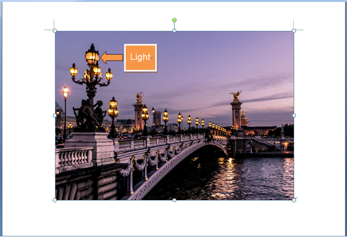 Annotate an image by adding an arrow and a text box